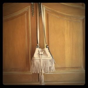 Adorable dusty pink fringed bucket bag